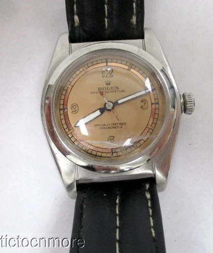 VINTAGE ROLEX OYSTER PERPETUAL BUBBLEBACK WATCH 2940 PINK DIAL MENS STAINLESS