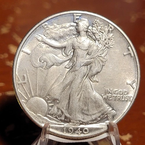 1940 WALKING LIBERTY HALF DOLLAR IN AU CONDITION.