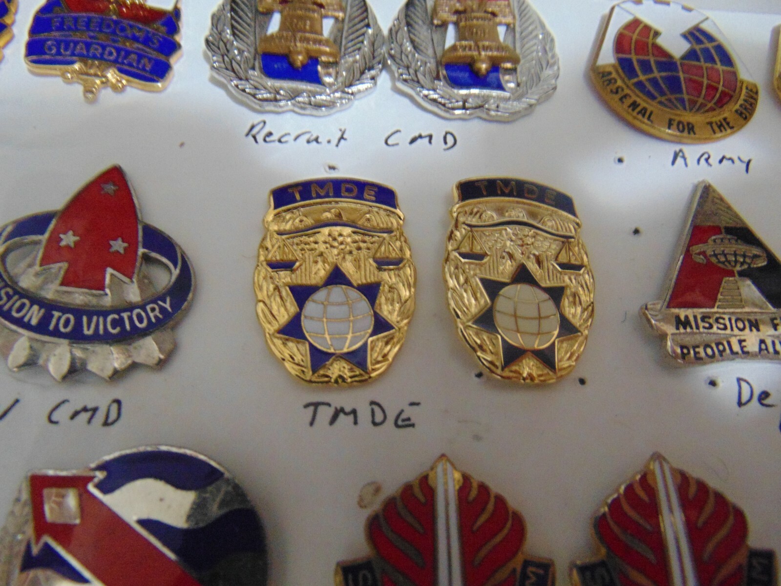 MILITARY INSIGNIA CREST DUI SET OF 2 TMDE TEST MEASUREMENT DIAGNOSTIC