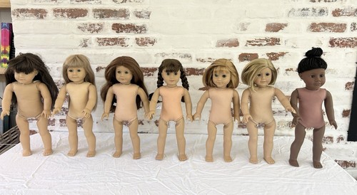 7 American girl Dolls