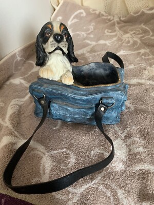 puppy in a purse