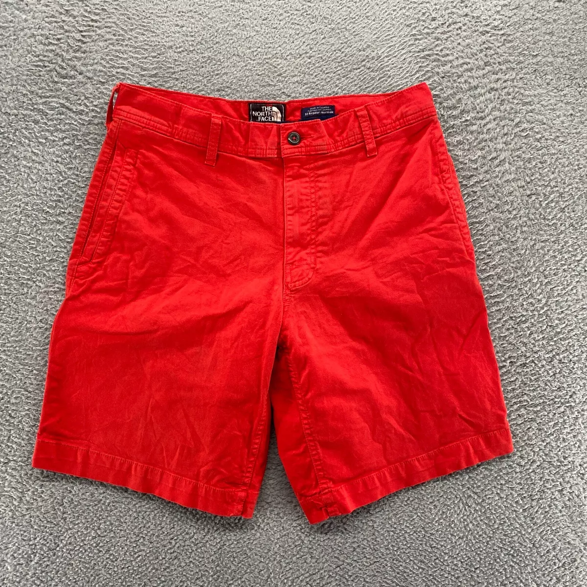 Red north face shorts sales