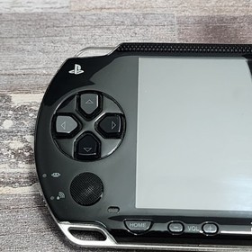 Sony PSP-1001 Console with Battery, Charger and 3 Games Bundle - USA
