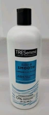 TRESemmé Silky & Smooth Anti-Frizz Conditioner for Frizzy Hair 28 oz .