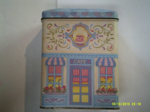 Candy Tin with Lid Decorated with A Cafe & Flowers 7" Tall x 4-3/4" Wide x 3"