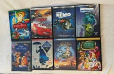 Lot Of 8 Disney and Pixar Animated Movies - Cars, Finding Nemo, Aladdin.