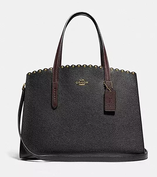 Coach charlie online carryall with rivets