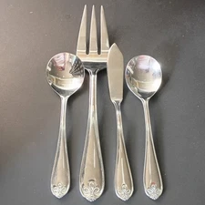 Lot of 4 Pieces Reed & Barton Ribbon Crest Stainless Flatware