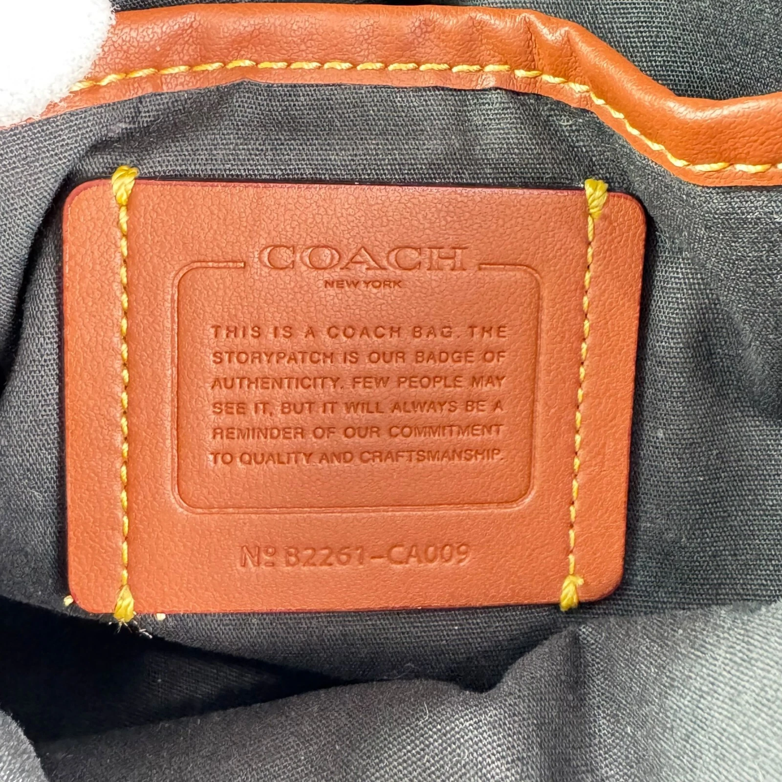 Tracolla ibrida Coach League in Cavas rivestita firmata con stampa mimetica