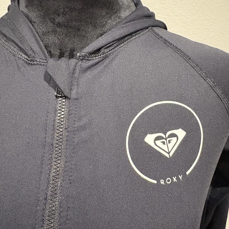 Camisa Roxy para mujer con cremallera Rashguard negra/blanca talla grande Foto 2 de 4