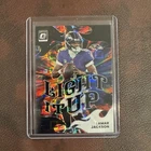 Lamar Jackson 2025 Panini Donruss Optic #14 Black Pandora Prizm Light It Up /149
