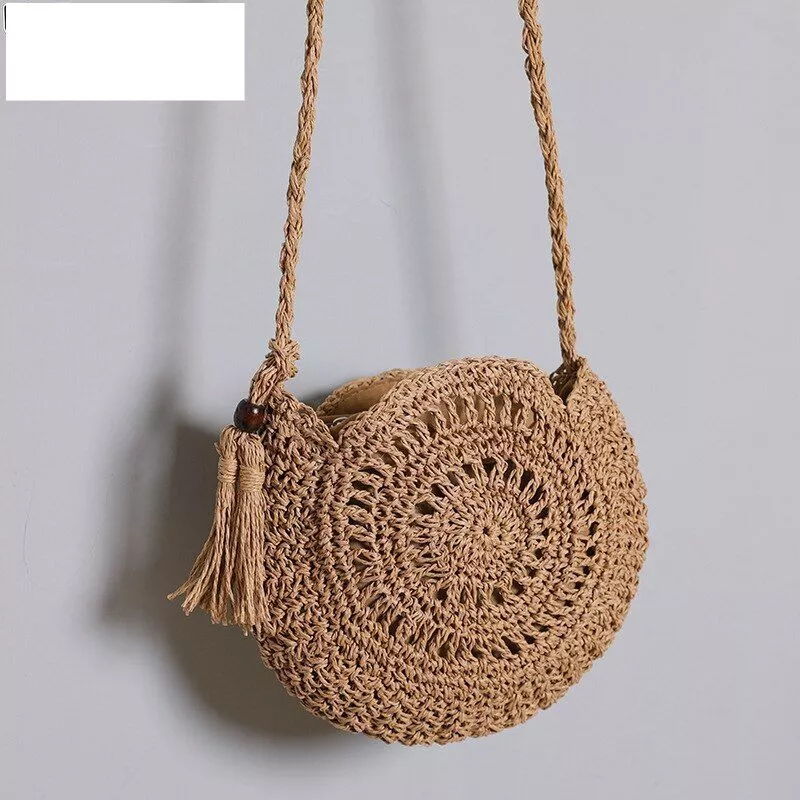 Round straw shop bag with tassels