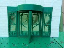 A Bayko Compatible 3D printed revolving hotel door with side panels and canopy