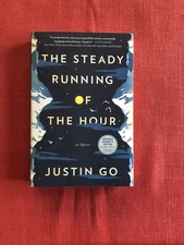 JUSTIN GO/THE STEADY RUNNING OF THE HOUR 2014 uncorrected proof 1st ed. 1st pr.