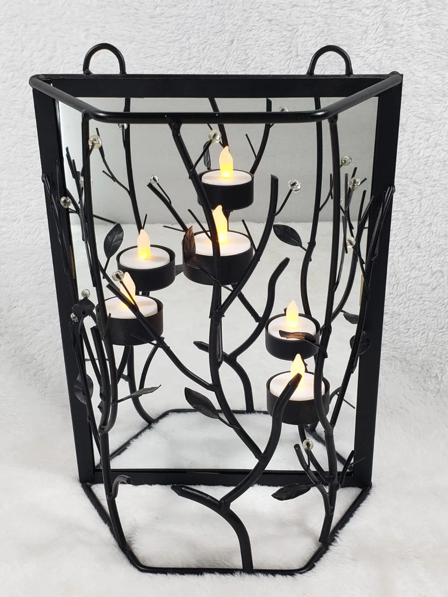 Black wrought iron wall sconces for candles deals