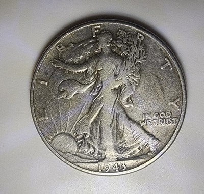 1943 Walking Liberty Half Dollar No Mint Mark Broad Strike. Nice