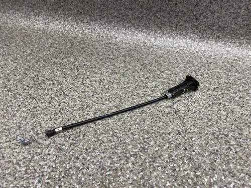 Fuel cap flap release cable