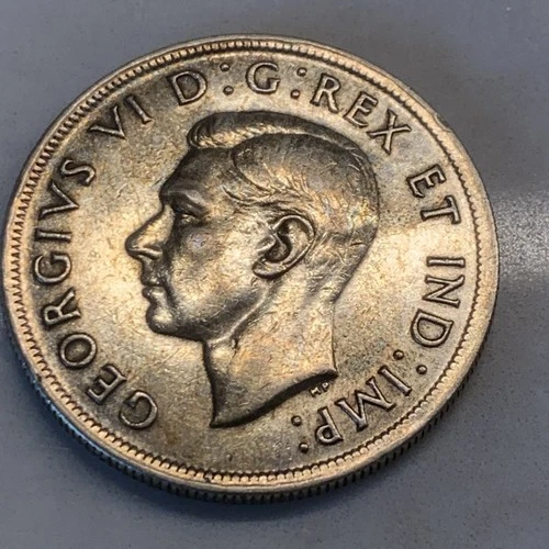 1938 canadian silver dollar- A/U -EXTRA FINE. Low mintage- Key date