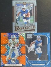Amon-Ra St. Brown 21PaniniLegacy RC #206, Mosaic Orange #67, Playoff Rookies #28