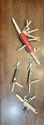 Lot of 4 Swiss Army Knives Victorinox Swiss Made