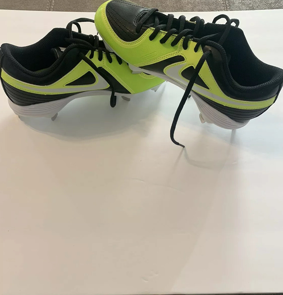 black and yellow softball cleats