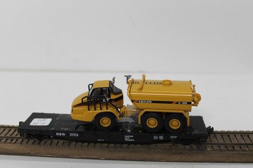 Coche plano Athearn 1391 escala HO 50' con carga CAT K500 N&W 2725 MW Kadees usado | Zustand: Used