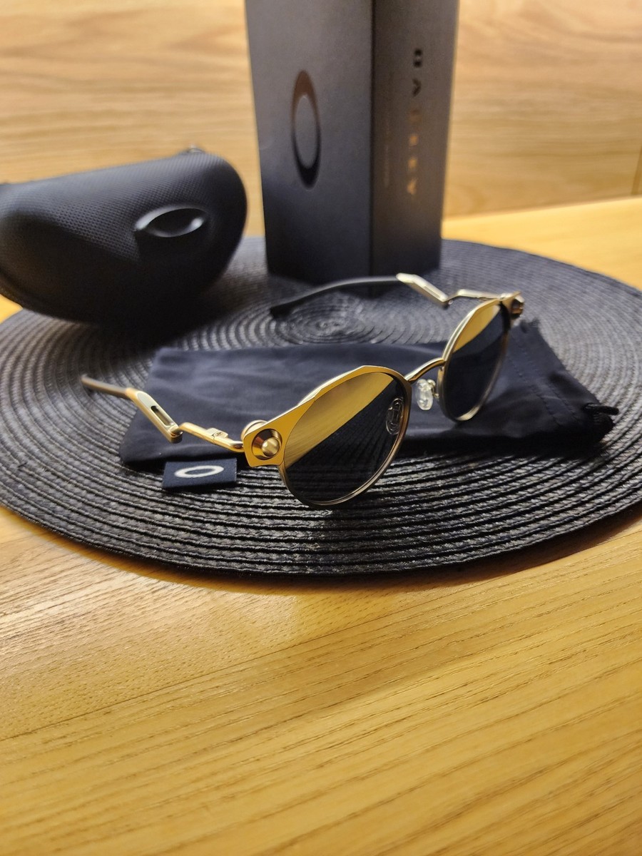 Oakley Deadbolt Metal Titanium Frame Silver Prizm Polarized Lens