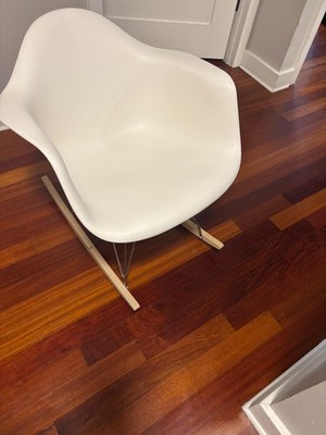Eames white molded plastic rocking chair