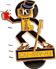 Kiwanis Inter. CAL-NEV-HA Division Apple/Toothbrush/Top Hat Lapel Pin