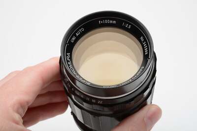 Sankyo Kohki Super Komura 100mm f2.5 lens Nikon F mount, clean