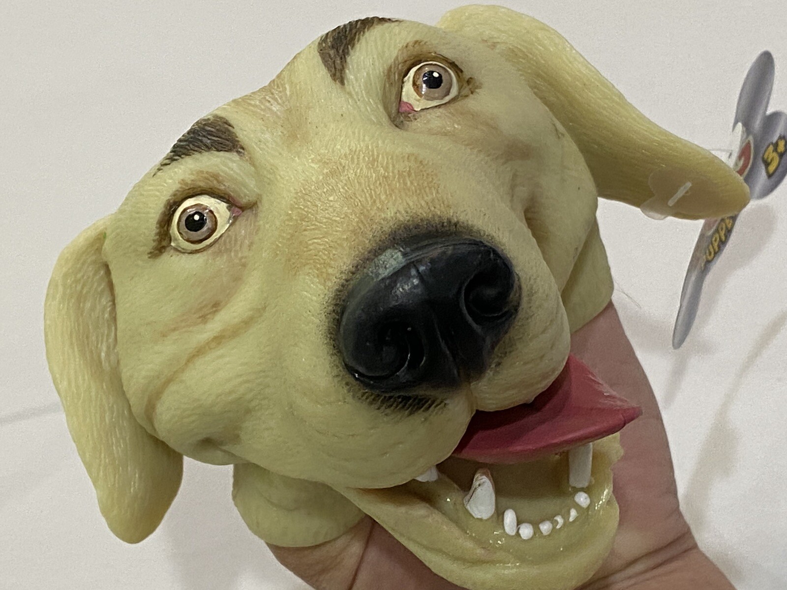 rubber dog hand puppet