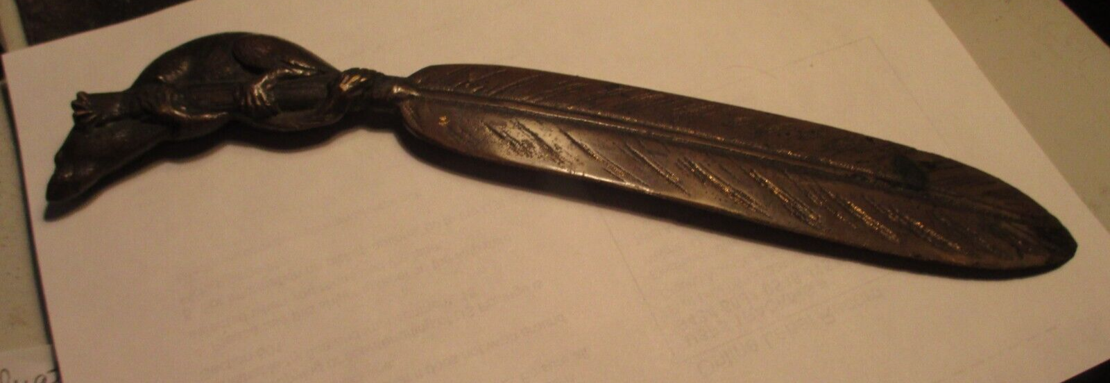 Brass Bronze Feather Letter Opener With Rat Sitting on top of feather