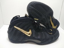 black and gold foamposite size 14