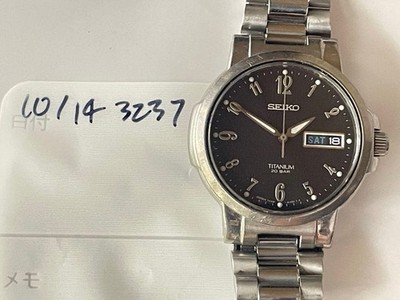 Seiko 7N43-7B80 Titanium Quartz Men's Watch Black Dial 36mm Analog