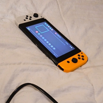 Nintendo Switch Console 32GB 720p HD Wi-Fi USB-C White/Orange Joy-Con