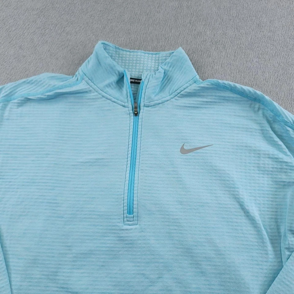Pullover para correr Nike Dri-Fit Sphere para mujer medio azul cuarto cremallera ligero Foto 2 de 4