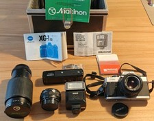 + Minolta XG-1 Kit Camera + 50mm f2 + 80-200mm Zoom + Winder G + Flash & Case +