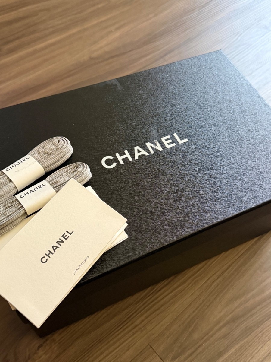 Authentic white Chanel sneakers size 39 worn twice. Minor scratch