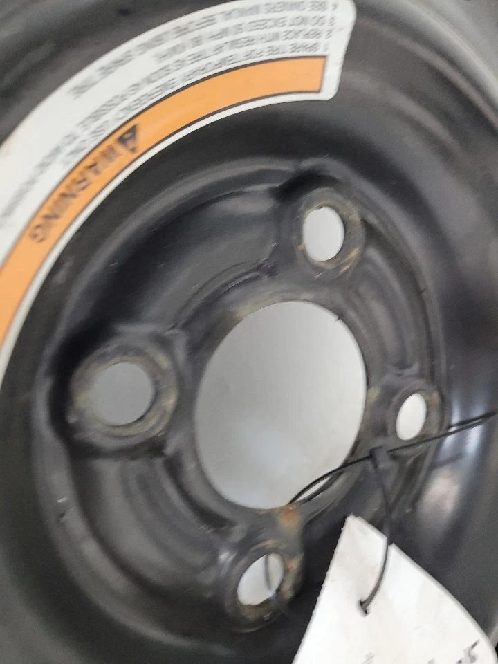 Nissan Versa 2012-2019 rueda de repuesto de acero 15x4 4 orejetas 403003BA7A T12570D15       Foto 2 de 4