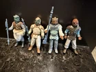 Vintage Star Wars figures 1983 Klaatu, Klaatu Skiff Guard, Weequay, and Nikto