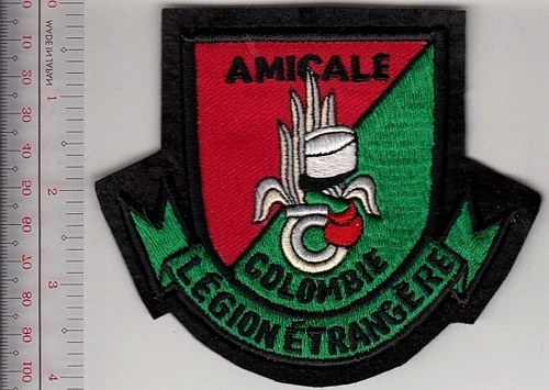 Green and red France Foreign Legion veteran patch with white border, red crest, and text “Amicale Colombia Légion Étrangère.”