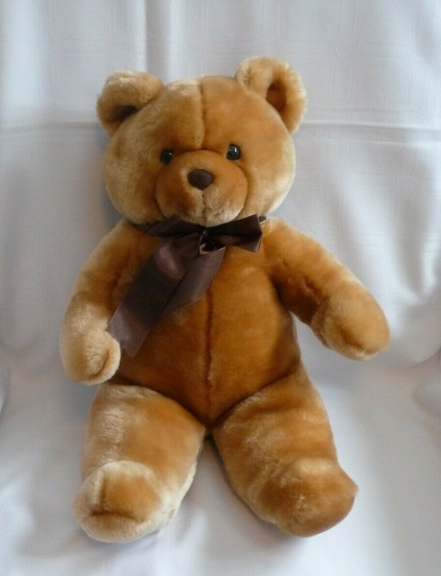 teddy bear with doll face