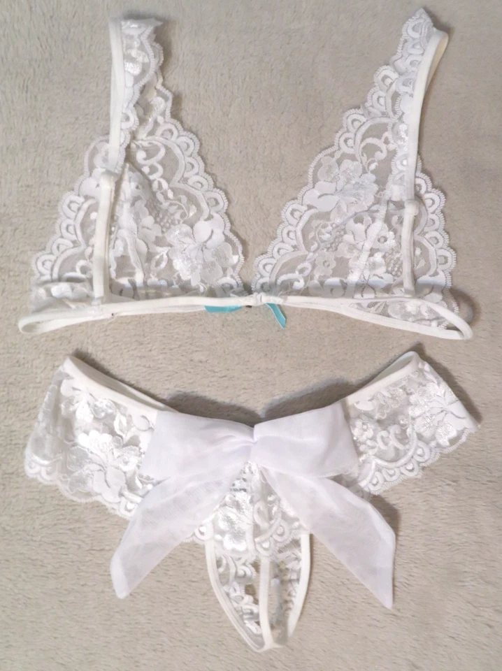 Conjunto de sujetador transparente y bragas con tanga Leg Avenue para mujer talla S/M Foto 2 de 3