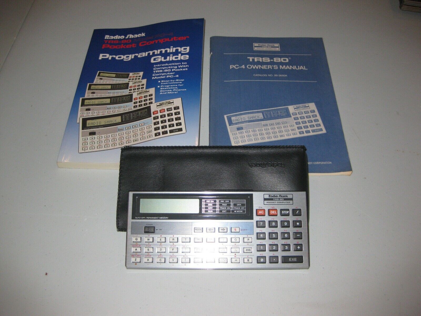 TRS-80 Model PC-4 Radio Shack Pocket Computer with manual and programming guide