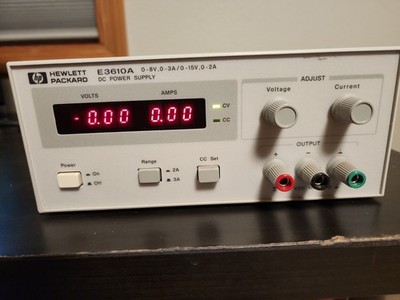 Hewlett Packard / E3610A / 0-8V, 0-3A ; 0-15V, 0-2A DC Linear Power Supply GOOD