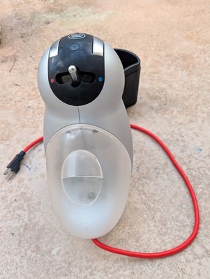 The NESCAFÉ Dolce Gusto Genio 2 single-serve capsule coffee machine. 