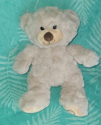TEDI Kuschelfreund Bär Teddy mit Herz cremefarbend