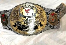 Réplica de cinturón del campeonato mundial de peso pesado calavera humo piel de serpiente talla adulto