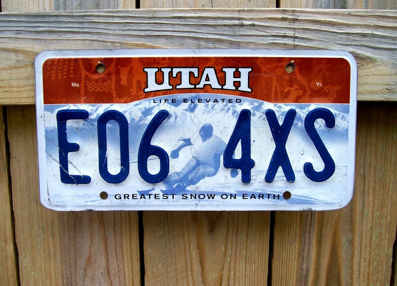 EXPIRED UTAH E06 4XS Skier Embossed Snow No Year Front License Plate Tag Metal