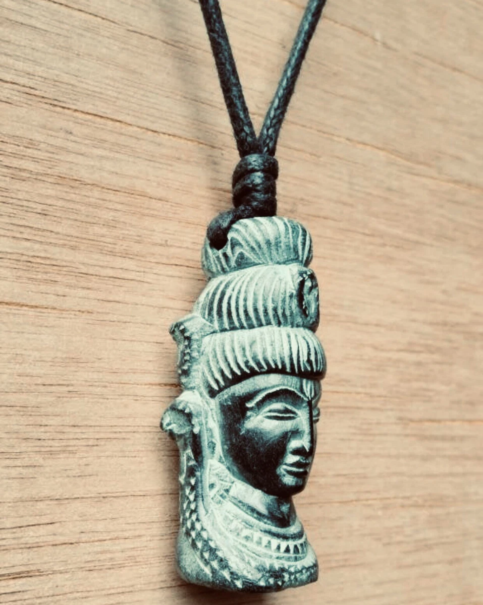 Carved stone best sale pendant